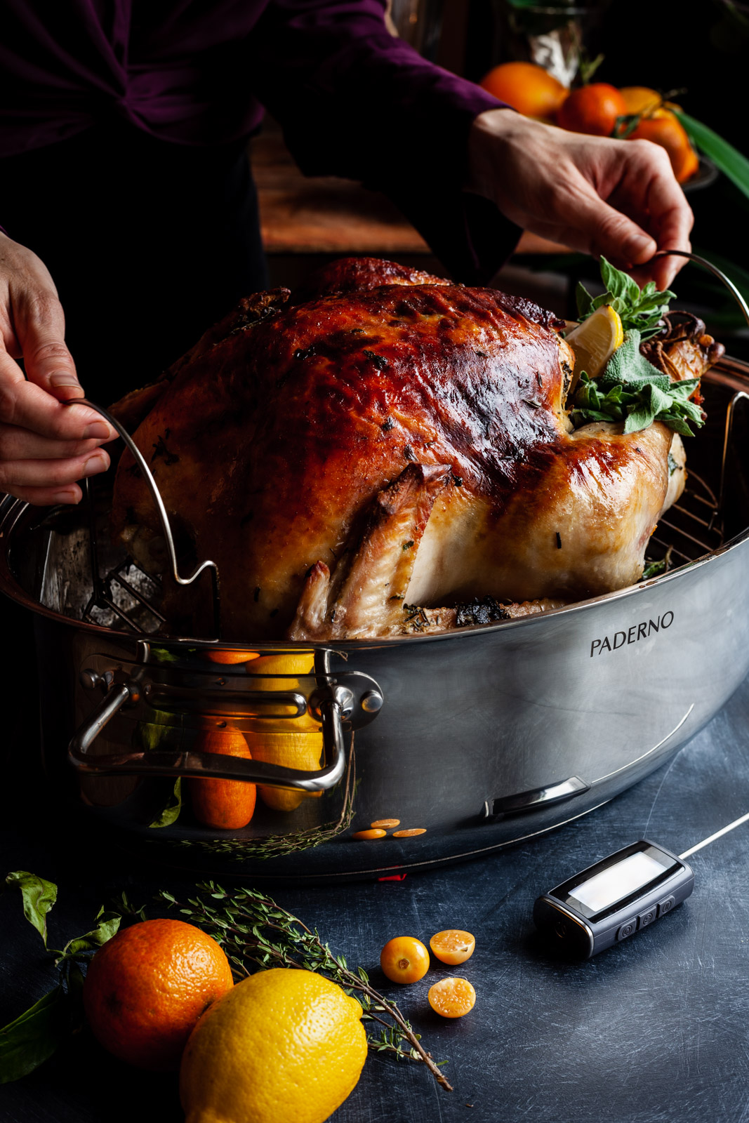 Removing a roasted turkey form the pan