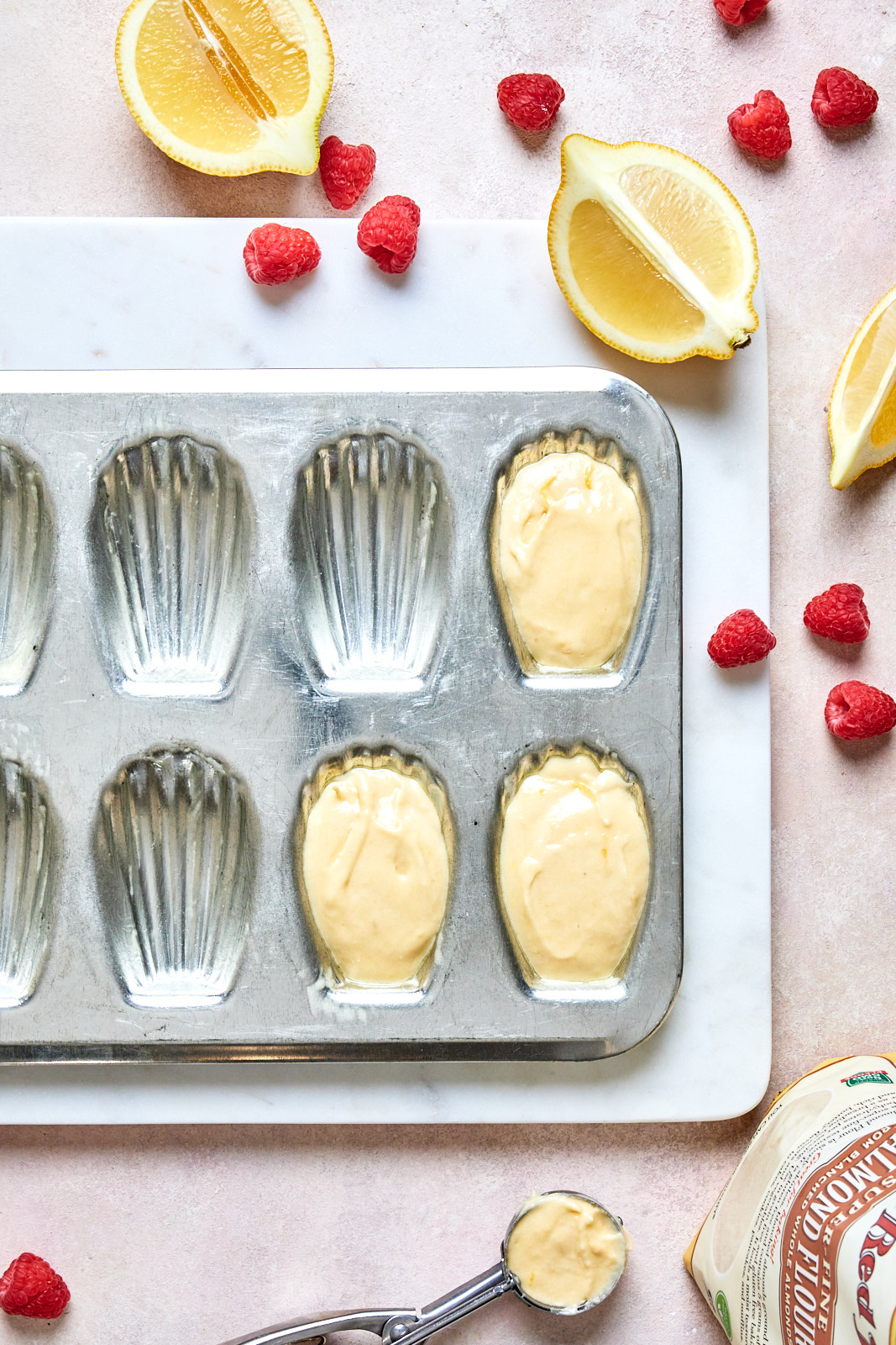 Easy Lemon Almond Madeleines With a Raspberry Glaze