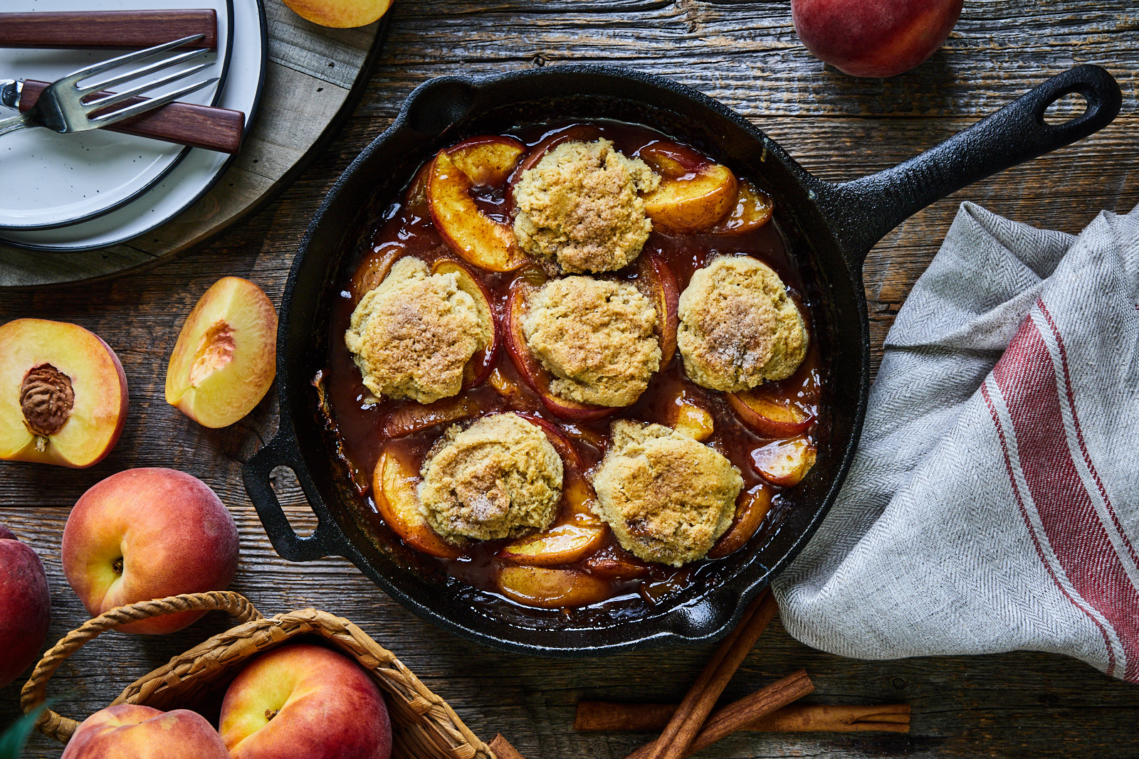 Cast iron skillet peach cobbler. In 12 inch cast iron skillet melt