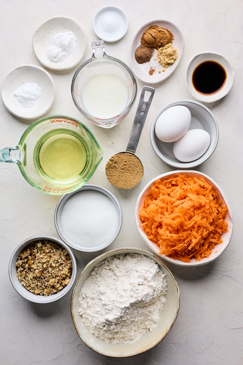 Ingredients for a moist and delicious carrot loaf cake