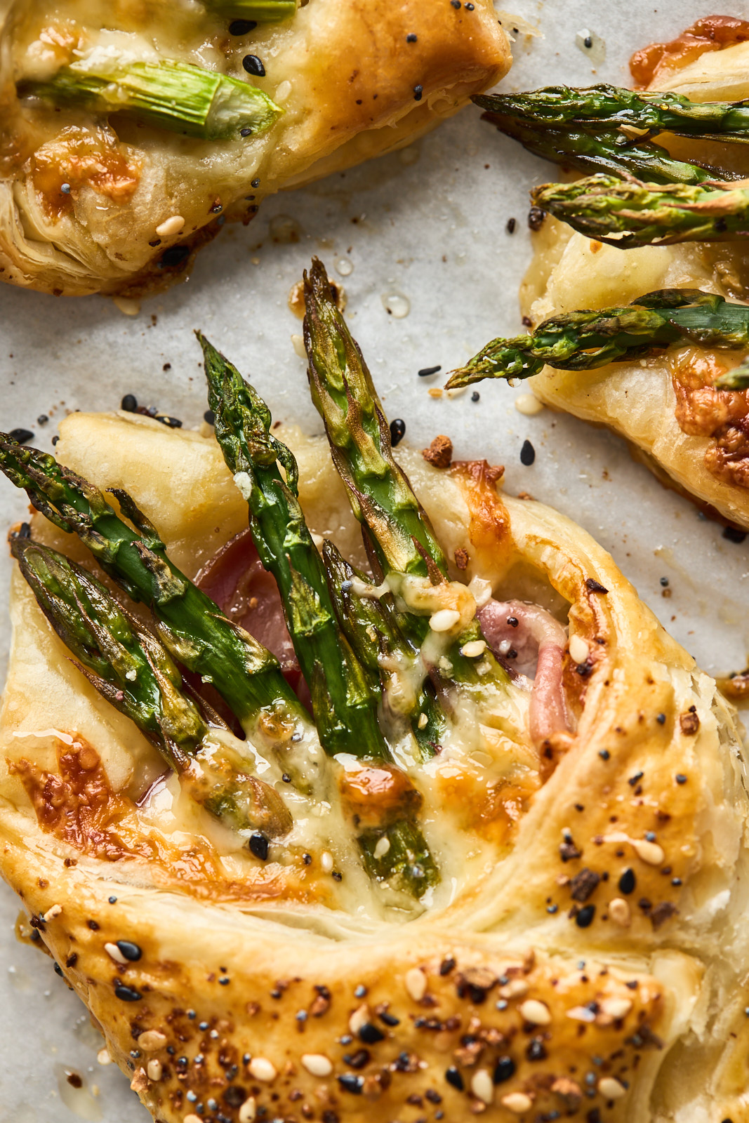 Asparagus Ham and Cheese Puff Pastry Bundles