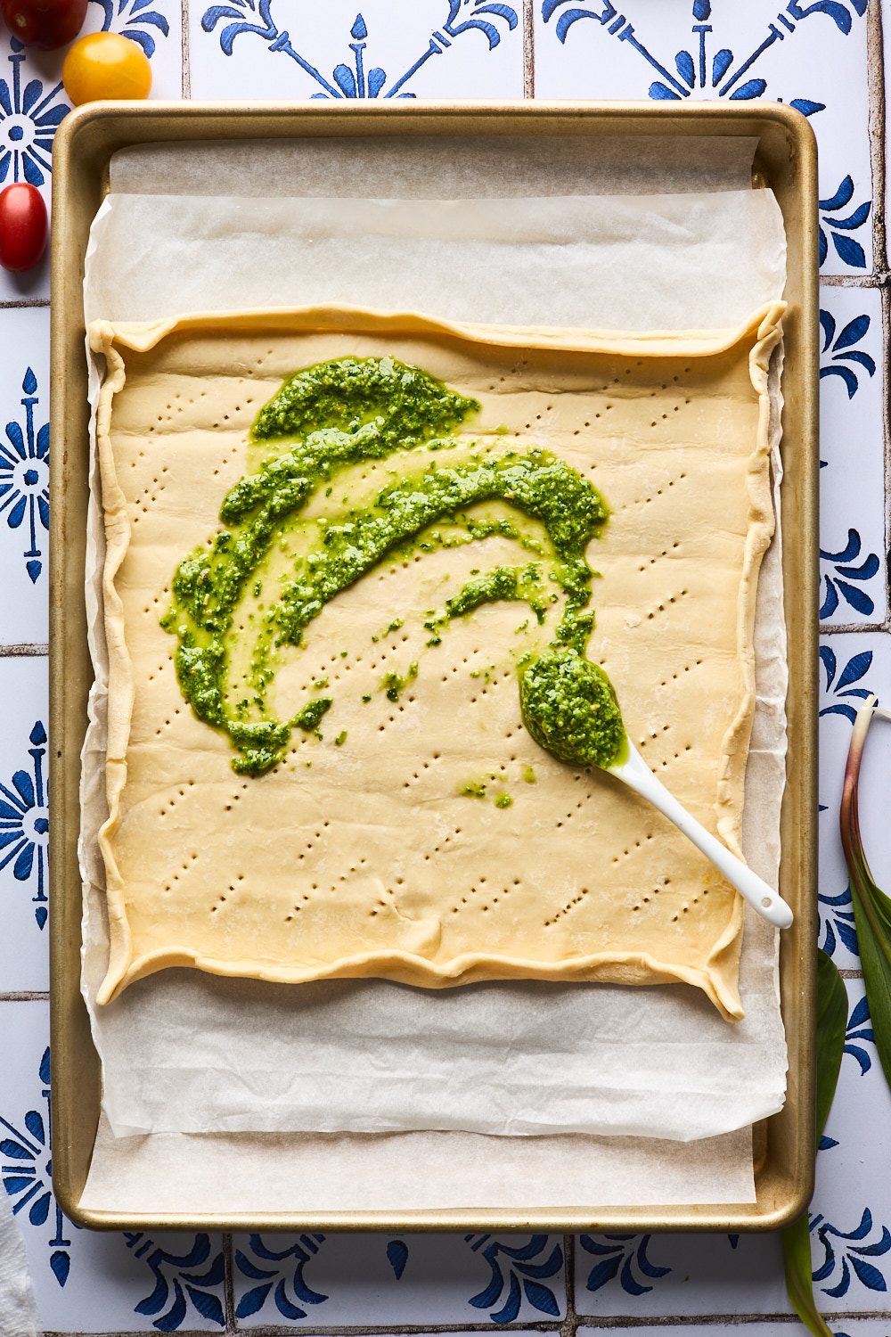 Pesto spread on a crust