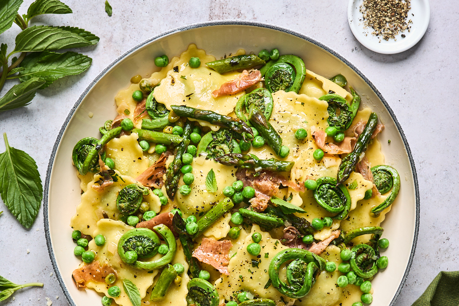 Lemon Butter Ravioli With Roasted Asparagus and Peas