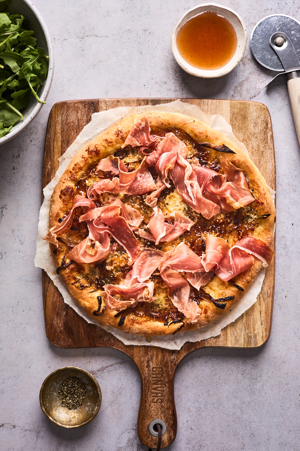 Fig Prosciutto Gorgonzola Arugula Pizza With Hot Honey