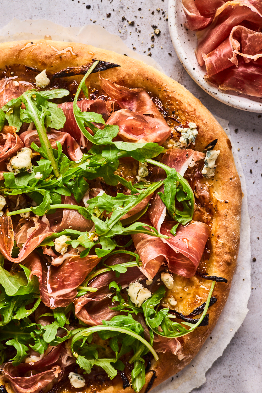 Fig Prosciutto Gorgonzola Arugula Pizza With Hot Honey