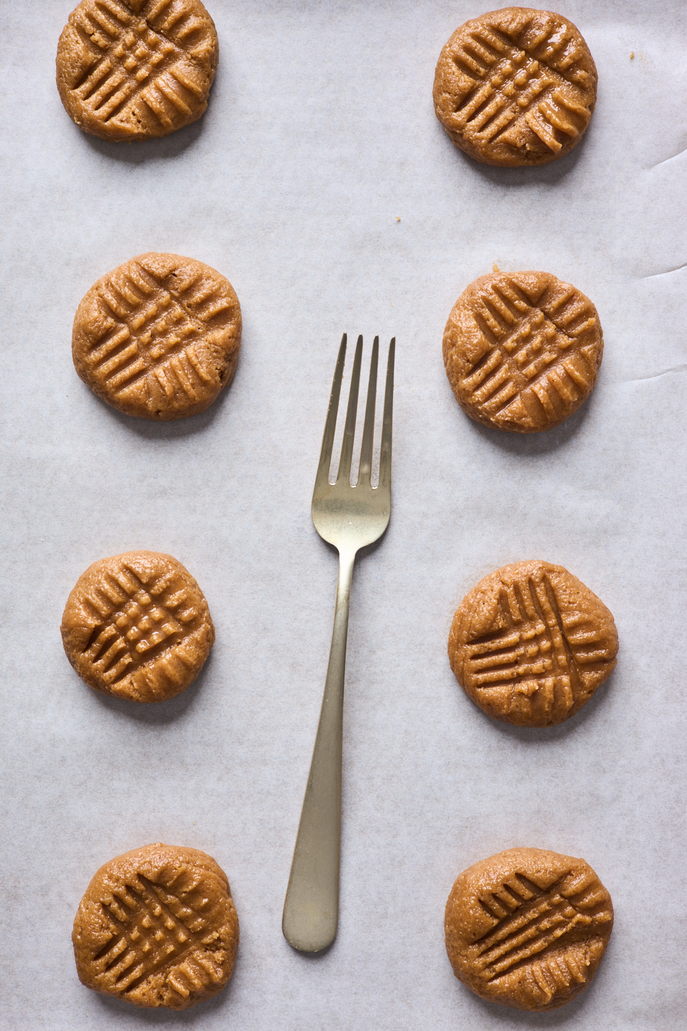 Flourless Chocolate Dipped Salted Peanut Butter Cookies