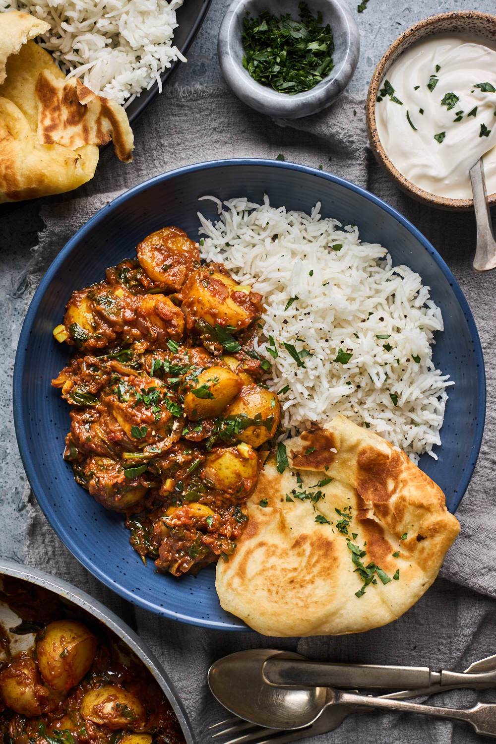 Saag Aloo with rice and naan