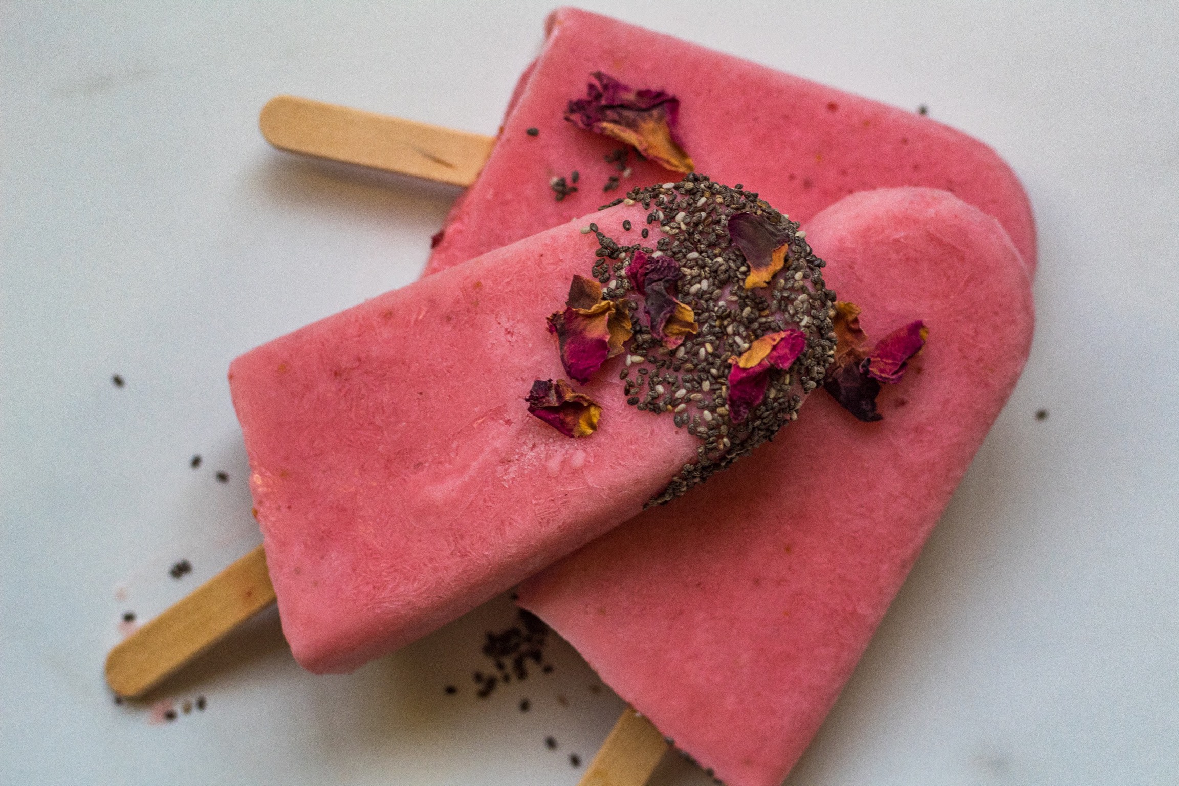 Strawberry goat milk kefir popsicles